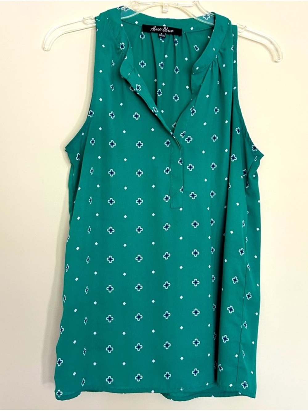 Alice Blue Women’s Green Sleeveless Blouse with Floral Design